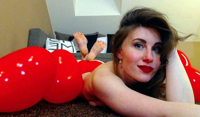 red lips mistress posing with balloons