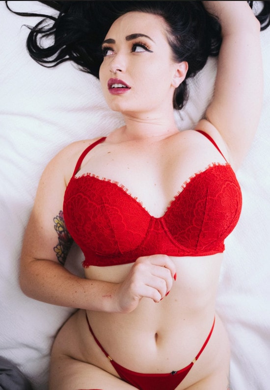 busty money mistress teasing big tits in red bra
